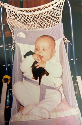 Baby mit Kätzchen